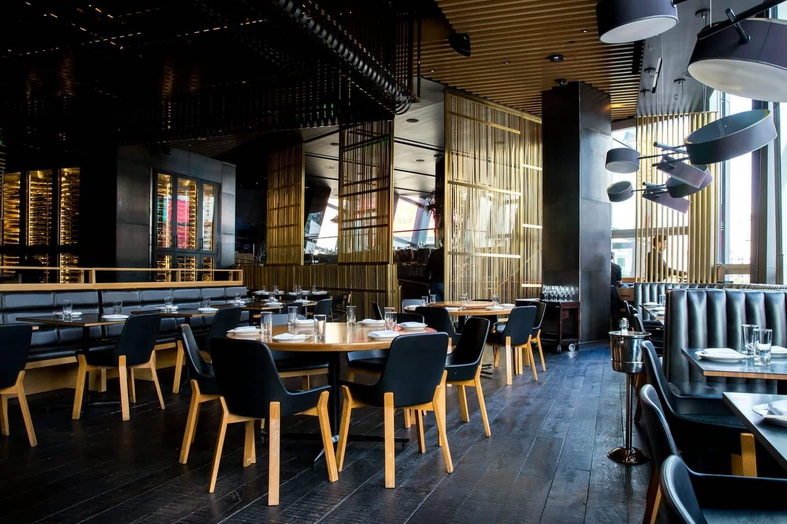 Ember dining room — brick, candlelight