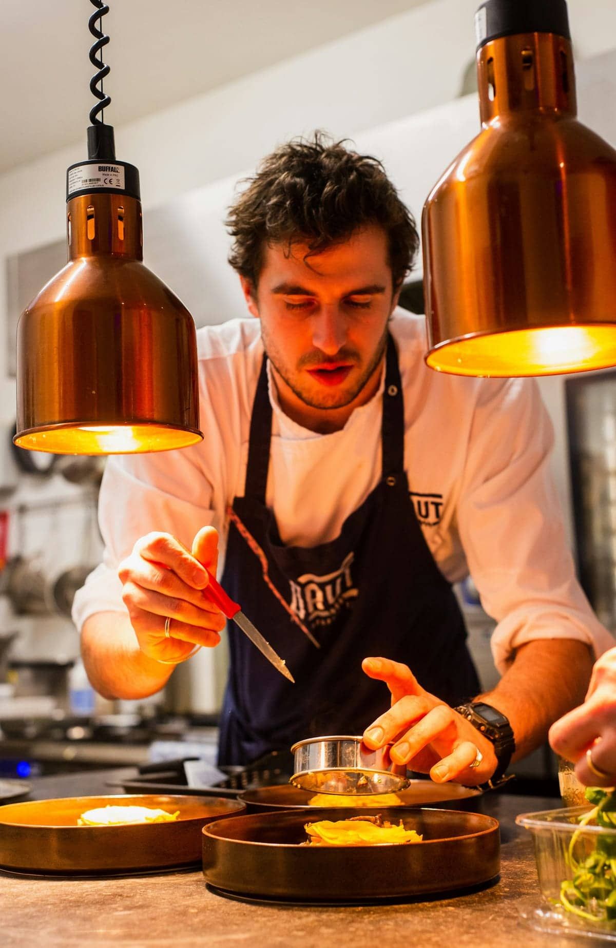 Chef James Callahan in the Ember dry-aging vault